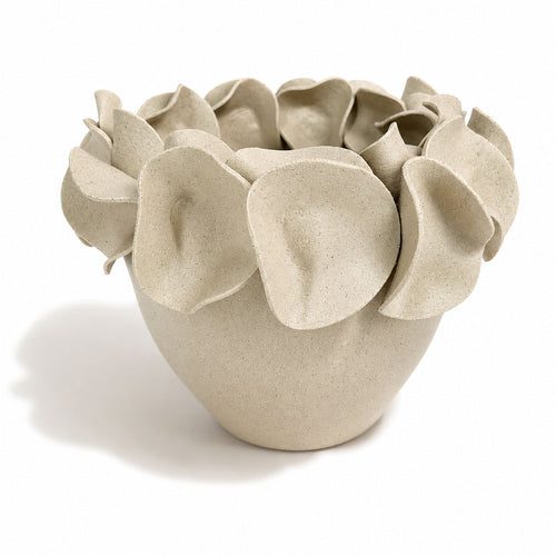 A light natural white speckled ceramic planter with a wide rim made of overlapping petal-like flaps, by Polly Barton Ceramics.
