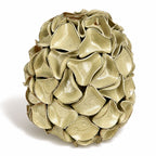 A sculptural egg-shaped decorative vase in melted mint glaze, overlapping petal-like surface folds.