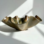 Bronze bowl with wavy design