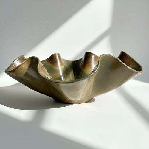 Bronze bowl with wavy design